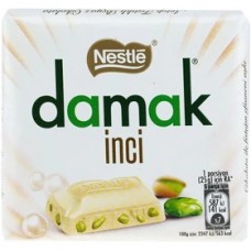 شکلات سفید شیری پسته ای داماک نستله - 60 گرم